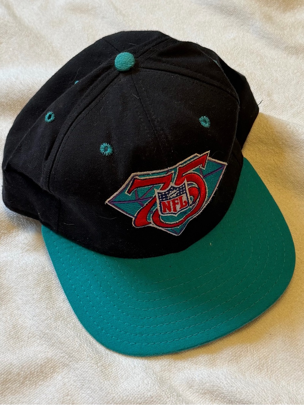 New Era Black and Teal NFL 75th Snapback Hat vintage